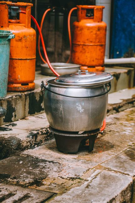 Cooking pot with gas cylinders on a street in Kuala Lumpur, Malaysia.