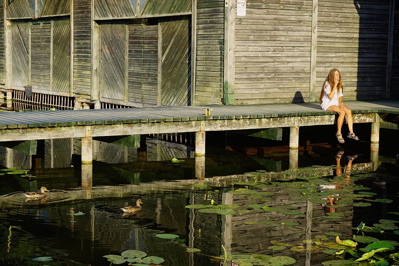 Woman, lake, smoking, footbridge, bridge, harbor, wooden, wooden platform, summer, nature, woman with a cigarette, seated woman, a person, character, girl smoking a cigarette, reflection, reflection i