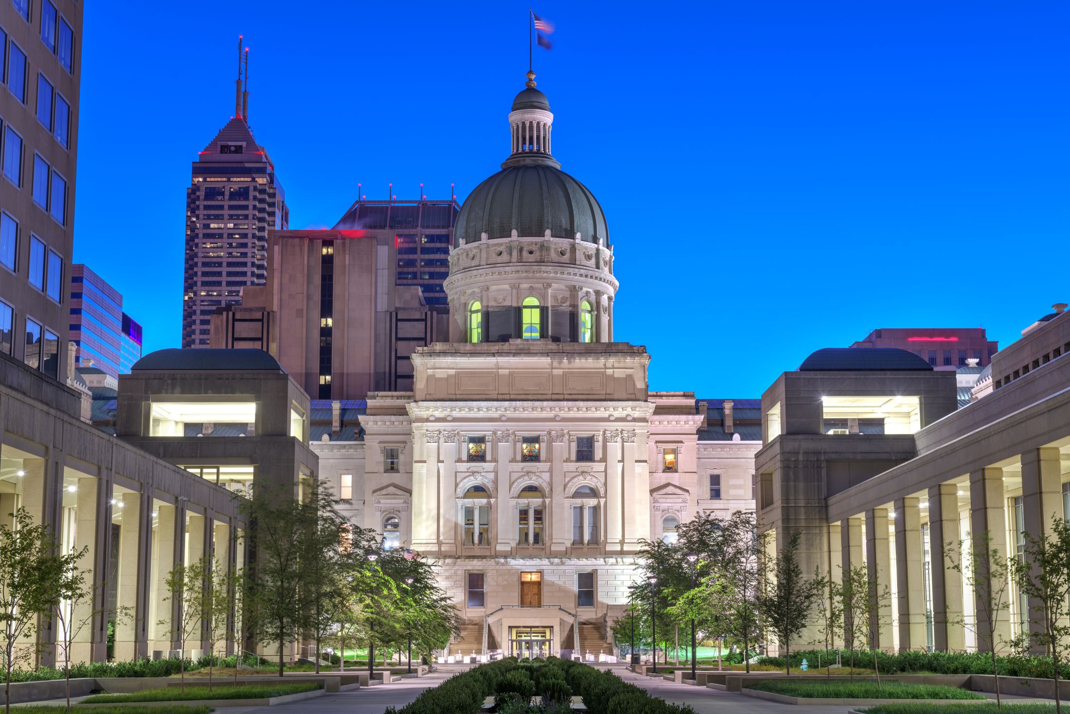 Indiana Statehouse in Indianapolis, lit at dusk