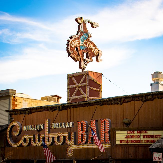 Historic Million Dollar Cowboy Bar sign with Western theme in Jackson, Wyoming.