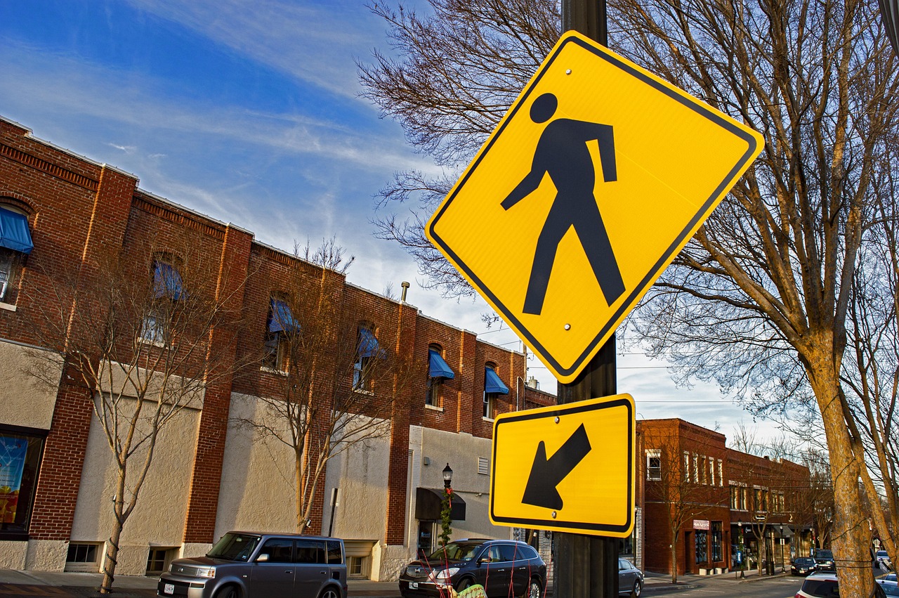 Pedestrian sign, traffic sign, walking sign, crosswalk, traffic, pedestrian, road, street, sign, city, crossing, warning, caution, yield, alert, walk, don't walk, intersection, lee's summit, missouri,