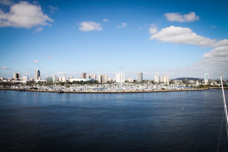 Stunning view of Long Beach city skyline and waterfront under a clear blue sky.