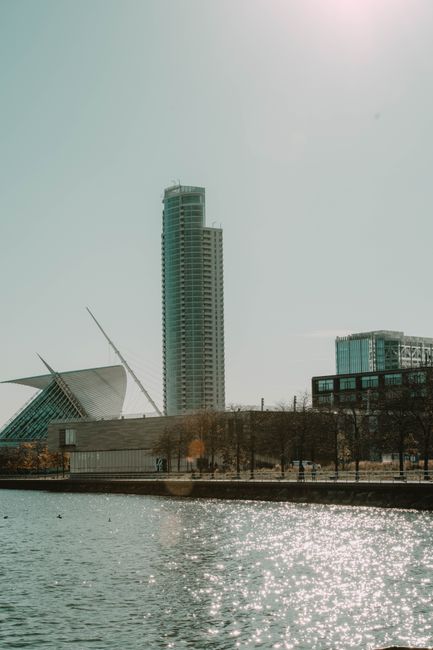 Stunning view of Milwaukee's skyline featuring modern architecture and sparkling waterfront under a clear sky.