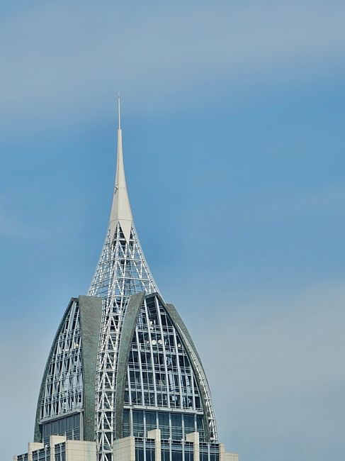 Close-up of the Renaissance Mobile Riverview Plaza Hotel spire against a clear blue sky, Mobile, Alabama.