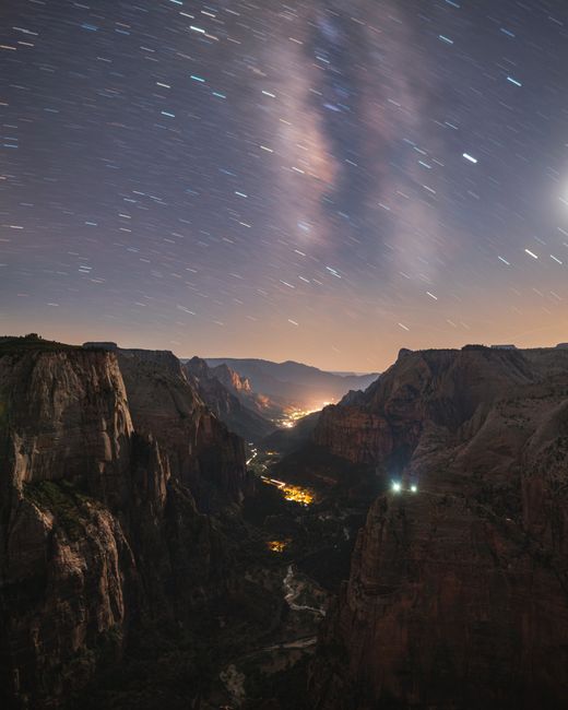 Starry night sky with Milky Way over rugged mountain landscape in Phenix City, Alabama.