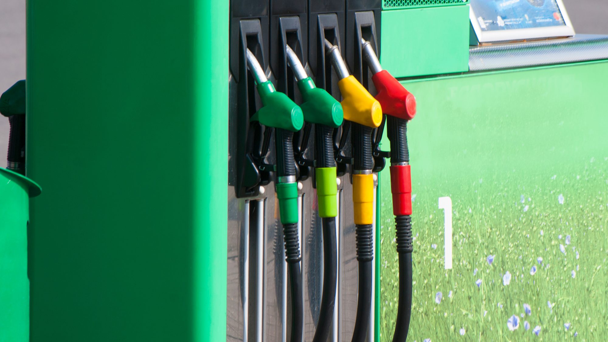 Green fuel pump with green, yellow and red nozzles