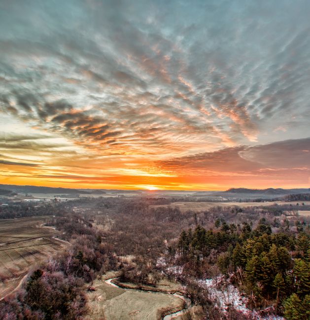 Stunning aerial landscape at sunset over Misha Mokwa, Wisconsin, highlighting nature's beauty.