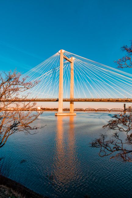 Stunning view of cable-stayed bridge over the Columbia River in Kennewick, WA during sunrise.